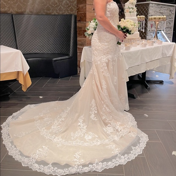 One time used - technically new. Very beautiful dress - Picture 1 of 7